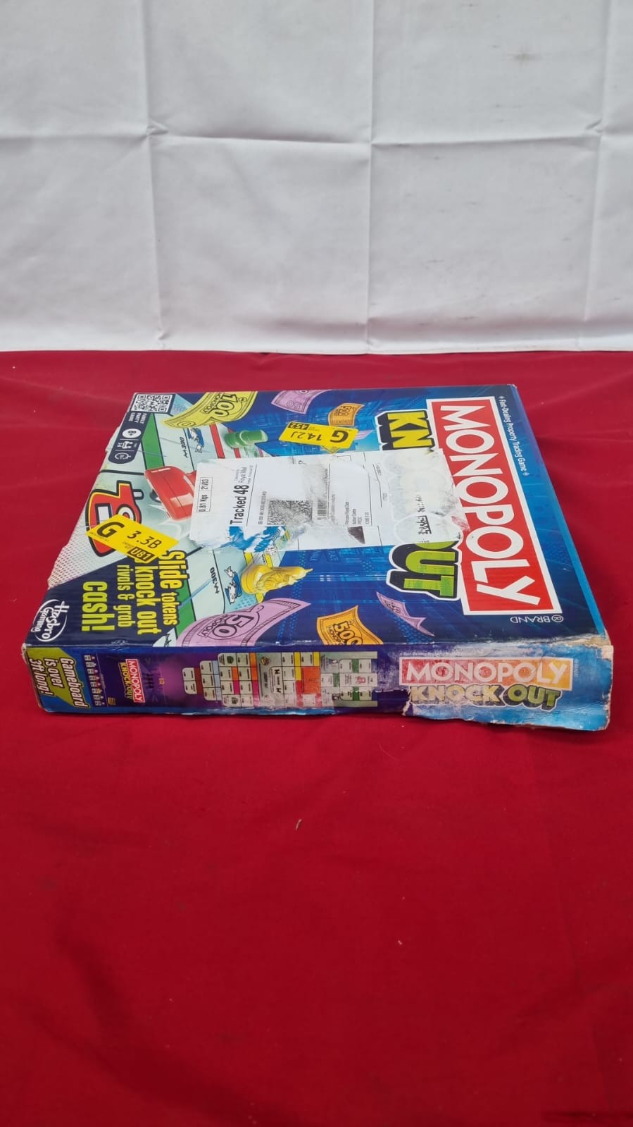 Monopoly Knockout, the extra hard version of the classic (box damages)