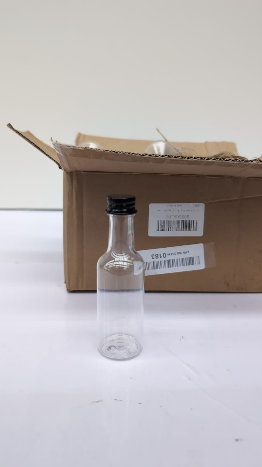 Pack of 25 Small Liquor Bottles for Filling, 50 ml Mini Bottles