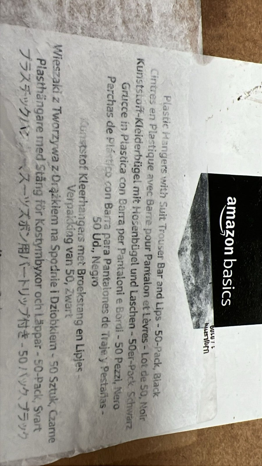 Amazon Basics Plastic Hangers with Suit Trouser Bar and Lips, Black (50-Pack)