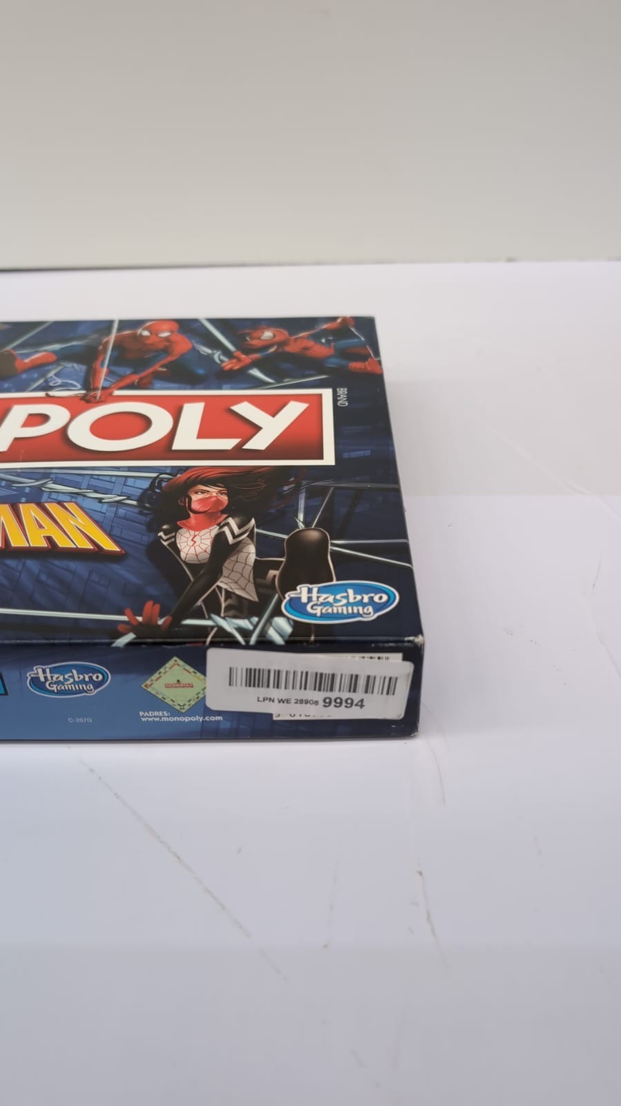 Monopoly: Spiderman Board Game -Play as an Arachnid Hero [Spanish]( box damaged)