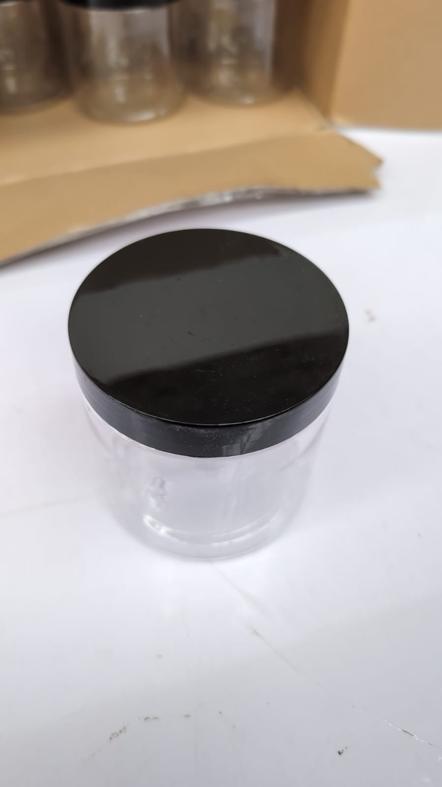 11 Pack Small Round Plastic Jars with Lids cheight - (lids have small scuffs)