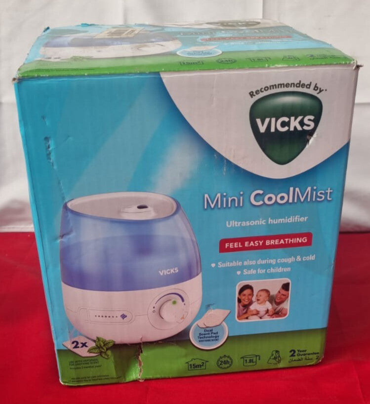 Vicks Mini Cool Mist ultrasonic humidifier - 1.8 L Tank (box damaged no pads)