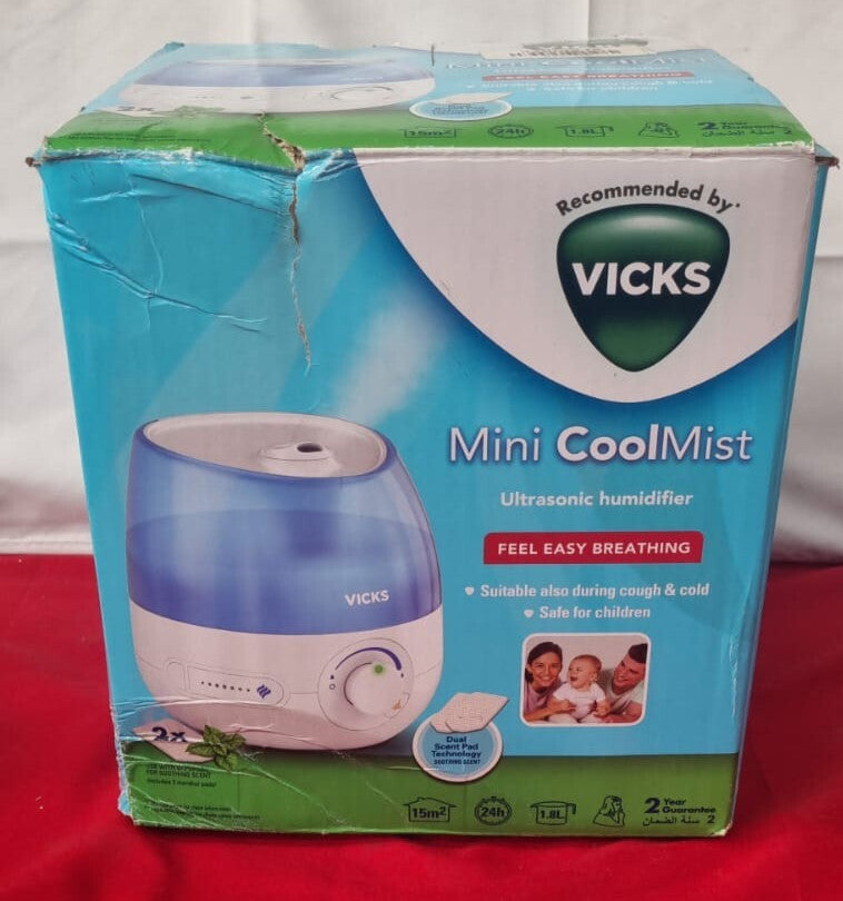 Vicks Mini Cool Mist ultrasonic humidifier - 1.8 L Tank (box damaged no pads)