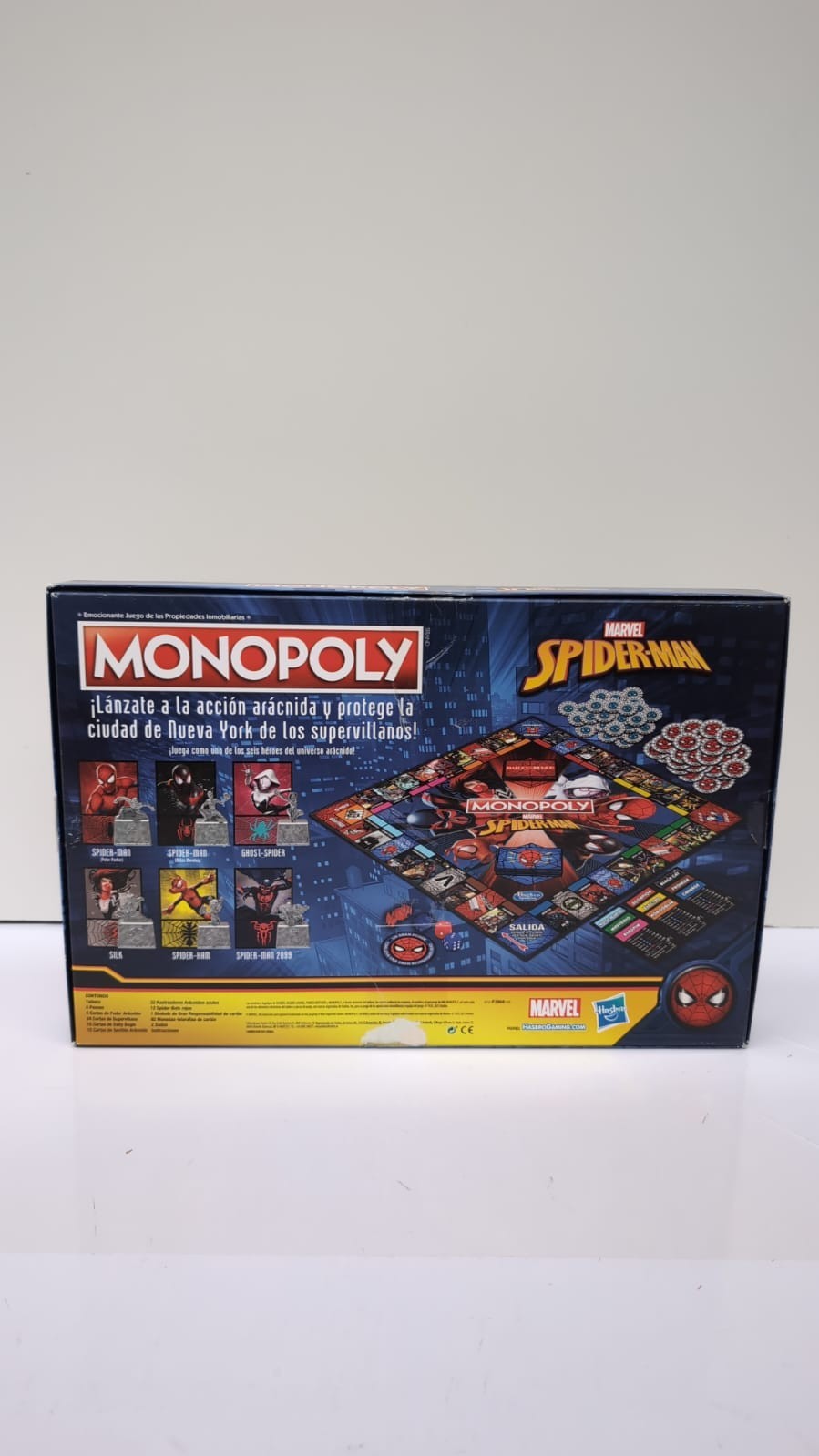Monopoly: Spiderman Board Game -Play as an Arachnid Hero [Spanish]( box damaged)